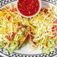 Chalupas · Crispy tortilla shells covered with vegetarian refried beans, mixed cheese, lettuce, tomato ...