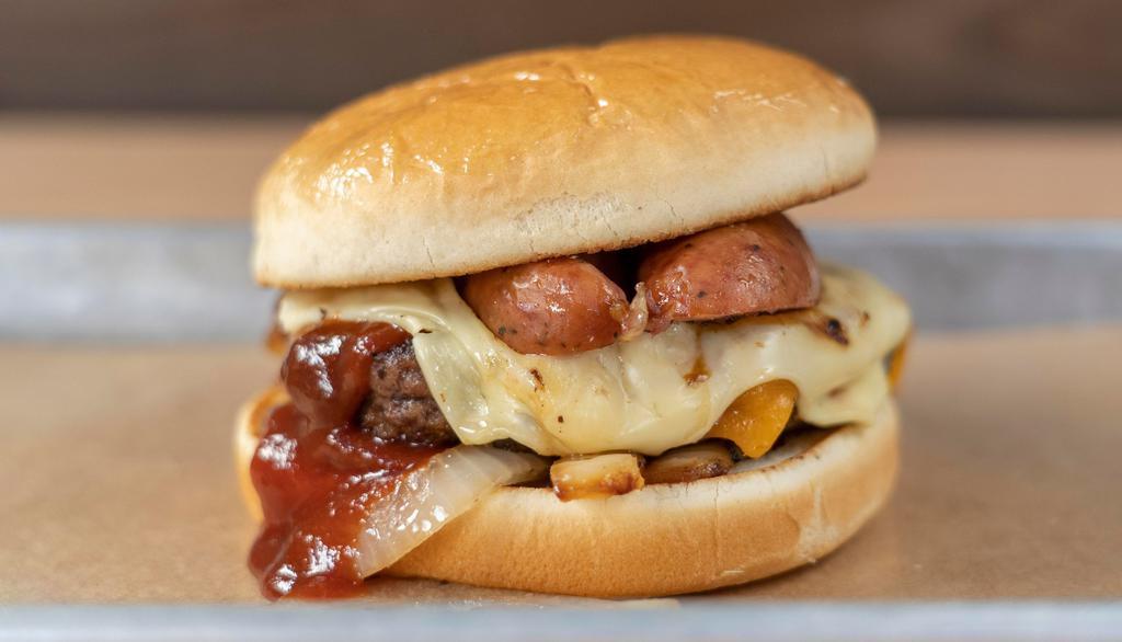 Wurst Burger · 1/2 pound burger with grilled onions, BBQ sauce, cheddar and pepper jack cheese, topped with kiolbassa sausage.