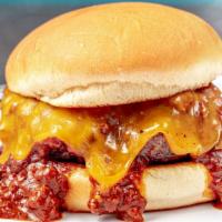 Chili-Cheese Burger · 1/2 pound burger with mustard, onions, chili, and cheese.