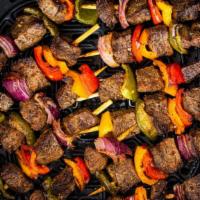 Beef Kabob · Seasoned beef tenderloin, grilled to perfection with grilled tomatoes and onions.