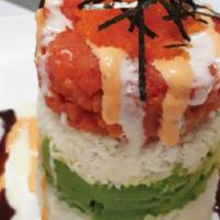 Ahi Tower · Spicy, raw. In: rice, crab meat, avocado, spicy tuna. Out: eel sauce, creamy sauce, spicy ma...