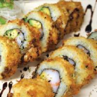 Crazy Boy Roll · In: stick crab, avocado. Out: eel sauce, chili sauce whole roll is fried.