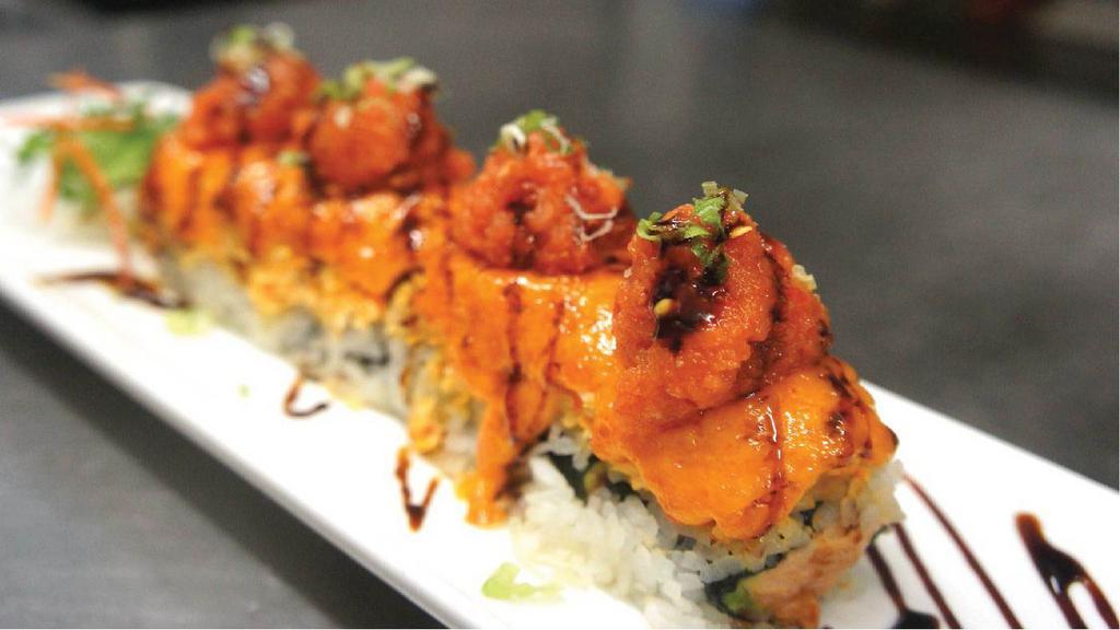 Volcano Roll · Spicy. In: spicy tuna, avocado. Out: spicy crab meat, spicy tuna, scallions, eel sauce.