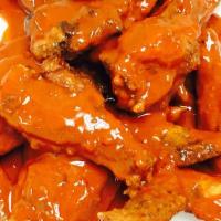 Chicken Wings (4) · Flavors: Spicy, Mild, Honey BBQ, Spicy Glazed.