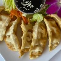 Pot Stickers · Pan- seared chicken and vegetable dumpling comes with house special sweet soy sauce.