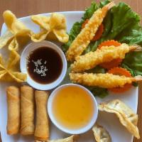 Thai Wok Sampler  · Egg rolls, Crab Rangoon, Pot stickers, Shrimp Tempura come with sweet&sour sauce and sweet s...