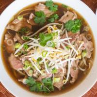 Pho (Thai Beef Noodle Soup) · An aromatic clear beef soup with rice noodles topped with bean sprout and cilantro.