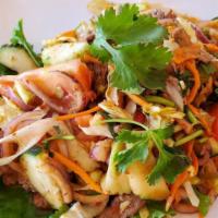 Thai Beef Salad( Yum Nuer) · Mixed with onion, lettuce, tomatoes, carrots, cucumber, cilantro chili lime dressing. Come w...