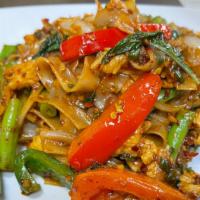 Pad Kee Maow(Drunken Noodles) · Stir-fried flat noodles with basil, bell peppers, onion, tomato.