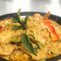 Hor Mok (Steam Curry Custard) · Cooked in curry paste, coconut milk, basil, napa, bell peppers and kaffir lime leaves, your ...