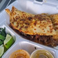 Quesadilla  · Choose Your Meat: Beef, Chicken, Campechano Or Pork, Large Flour Tortilla, Grill Onions, Cil...