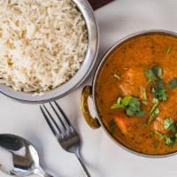 Chicken Tikka Masala · Cubes of white meat chicken tandoori-style, cooked in a rich creamy tomato sauce.
