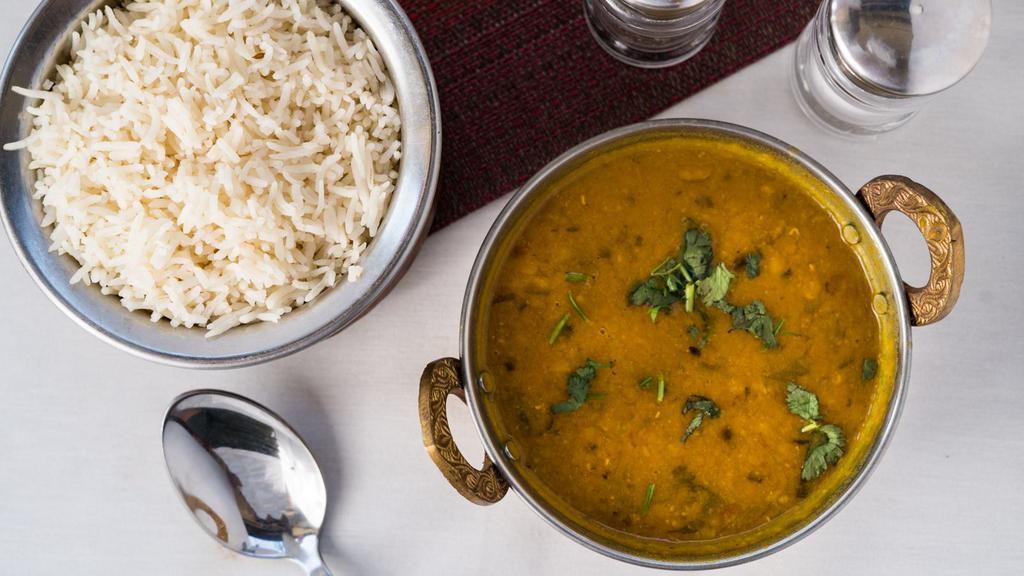 Dal Tadka · Mixed lentils cooked with fresh herbs & spices, sauteed in butter & garnished with fresh coriander.