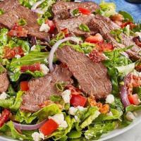 Steak And Gorgonzola Salad · Seared sirloin steak, gorgonzola cheese, applewood smoked bacon, tomato, red and green onion...