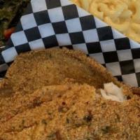 Cajun Fried Catfish · 2 fillets, seasoned Cajun-style, and fried to golden perfection. Served with choice of 2 sid...