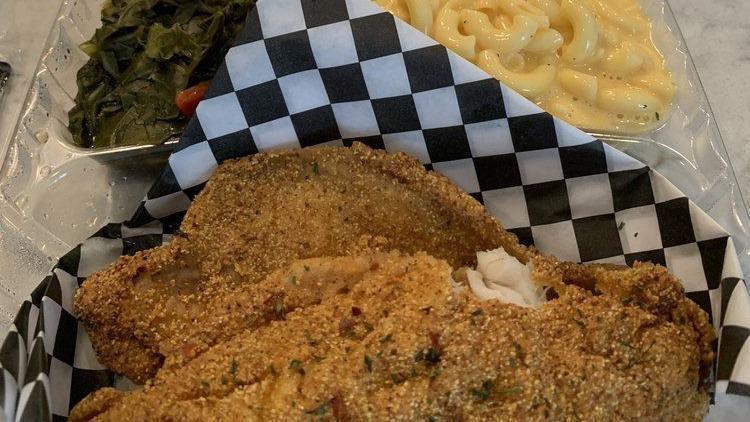 Cajun Fried Catfish · 2 fillets, seasoned Cajun-style, and fried to golden perfection. Served with choice of 2 sides.