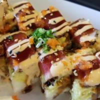 Michi Roll · Shrimp tempura, crab salad, cream cheese, topped with fresh avocado, seared tuna, teriyaki, ...