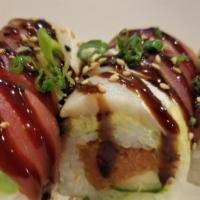 Custer Roll · Soy-wrapped, spicy tuna, cucumber topped with maguro (ahi tuna) and hamachi (yellowtail), te...