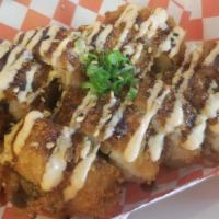 Veggie Roll · Avocado, cucumber, panko-fried, topped with vegan teriyaki, spicy mayo, green onion, and ses...