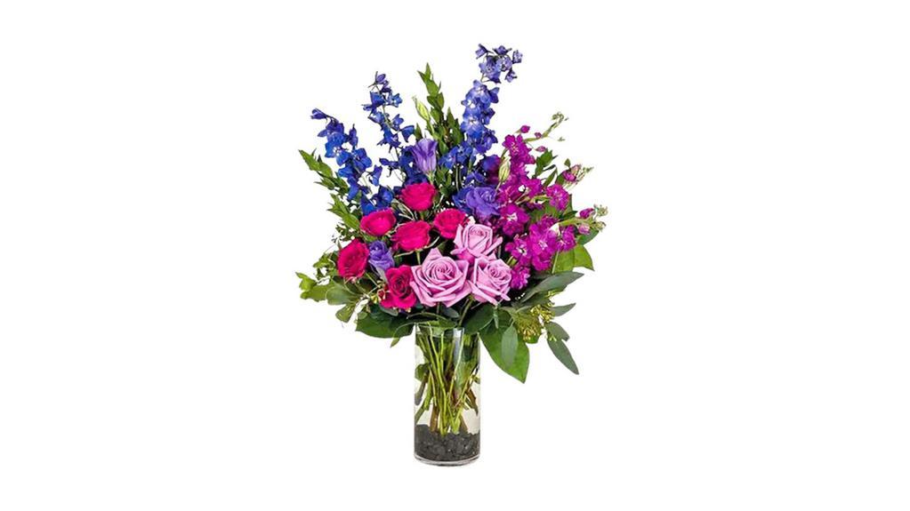 Sapphire · This floral arrangement is as precious as a jewel! Gorgeous flowers in blues, lavender, magenta and hot pink are arranged in a clear cylinder vase.

Approx. 23