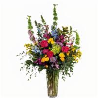 Summer Meadow · This tall and airy floral arrangement is chock full of flowers in mix of bright colors and t...