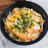 Shrimp Rice Bowl · A bowl of rice topped with shrimp tempura, half cooked egg and onions which shimmered in a s...