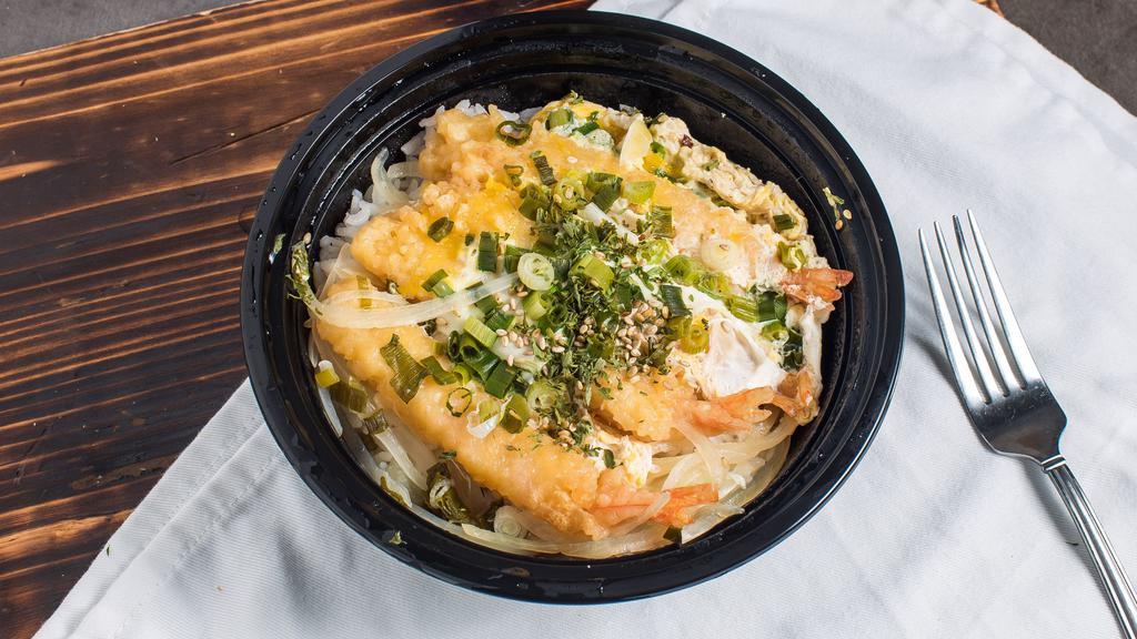 Shrimp Rice Bowl · A bowl of rice topped with shrimp tempura, half cooked egg and onions which shimmered in a sweet soy sauce base.