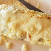 Ham Omelet · Omelet with 99% lean ham topped with cheese.