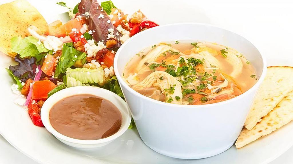 Soup With Greek · Our Lemon Chicken Soup with our Greek Salad. Fresh mixed lettuce, tomatoes, cucumbers, roasted red peppers, red onions, feta, pepperoncini, kalamata olives, and Greek dressing
