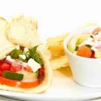 Greek Salad Gyro · Tomatoes, cucumbers, roasted red peppers, red onions, mixed lettuce, feta and Greek dressing...
