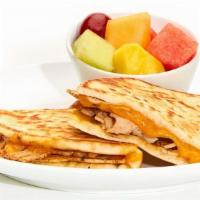 Kid'S Turkey Melt · Seasoned grilled turkey and cheddar on griddled pita served with your choice of chips or fruit