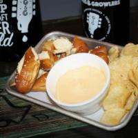Beer Cheese Dip With Pretzels · Beer cheese dip made with fat tire beer and hot pretzels.