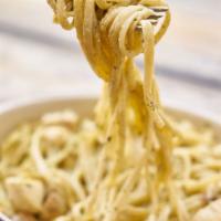 Fettuccine Alfredo · Fettuccine pasta tossed in our creamy alfredo sauce