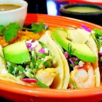 Grilled Seafood Tacos · 3 grilled fish or shrimp, chipotle crema, queso fresco, tex-mex slaw, on corn tortillas. Ser...