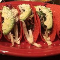 Classic Crispy Tacos · Three crispy tacos filled with seasoned taco meat or all white meat shredded chicken topped ...