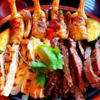 Del Mar Grill · Our juicy tender fajitas & four jumbo shrimp brochette over grilled onions.