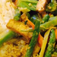 Tofu & Vegetable Fried Rice · Stir fried broccoli tofu baby bok choy and carrot serve with fried rice.
