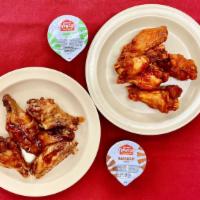 Wings · Your choice of Traditional Breaded, Buffalo, or Cajun Sweet & Sour Chicken Wings