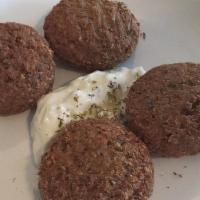 Falafel · Deep fried balls made from ground chickpea mixture. Comes with a side of tzatziki.