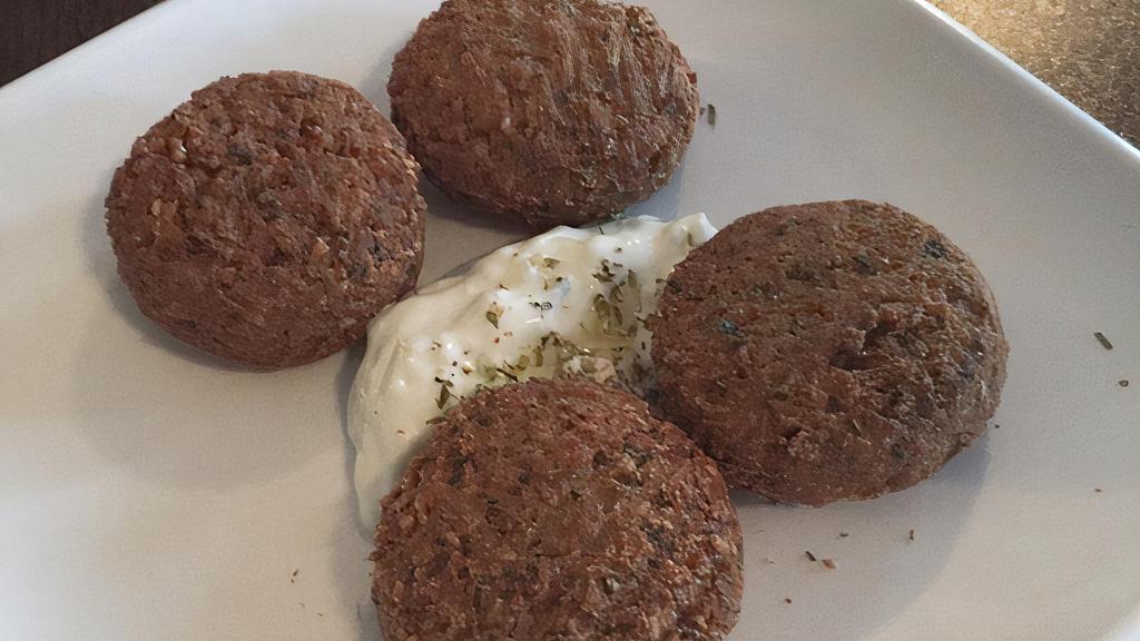 Falafel · Deep fried balls made from ground chickpea mixture. Comes with a side of tzatziki.
