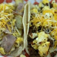 Tacos Breakfast · With eggs, cheese and choice of style. Choose a style: chorizo, ham, bacon, potato, a la mex...