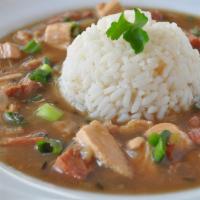 Chicken & Sausage Gumbo · Our delicious gumbo served with a scoop of rice.