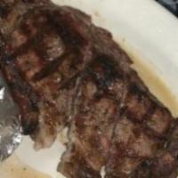 Ribeye Steak · 12 oz. steak served with our own garlic steak sauce