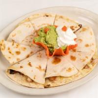Cheese With Chicken & Beef Fajita Quesadilla · Two extra large tortillas filled with monterrey jack cheese, chicken fajita meat and beef fa...