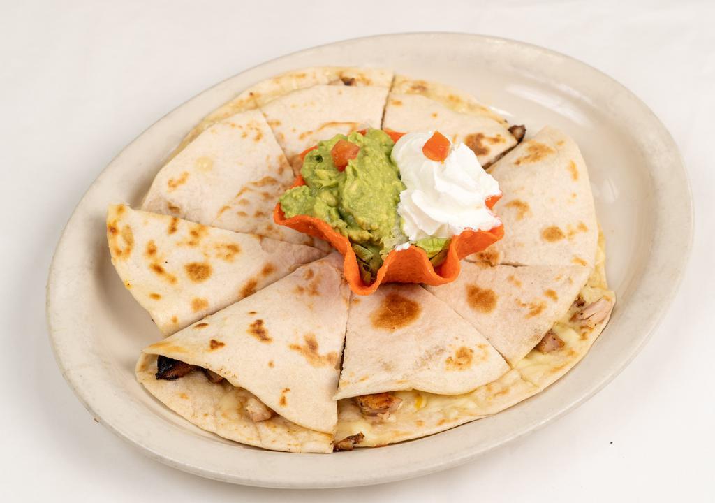 Cheese & Beef Fajita Quesadilla · Two extra large tortillas filled with monterrey jack cheese and beef fajita meat. Served with guacamole and sour cream.
