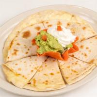 Cheese Quesadilla · Two extra large tortillas filled with Monterrey jack cheese. Now served with Guacamole and S...