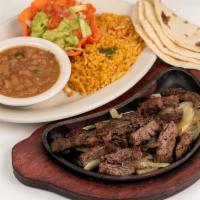 Beef Fajita Plate · Delicious beef fajitas. Served with lettuce and tomato, and a side of guacamole