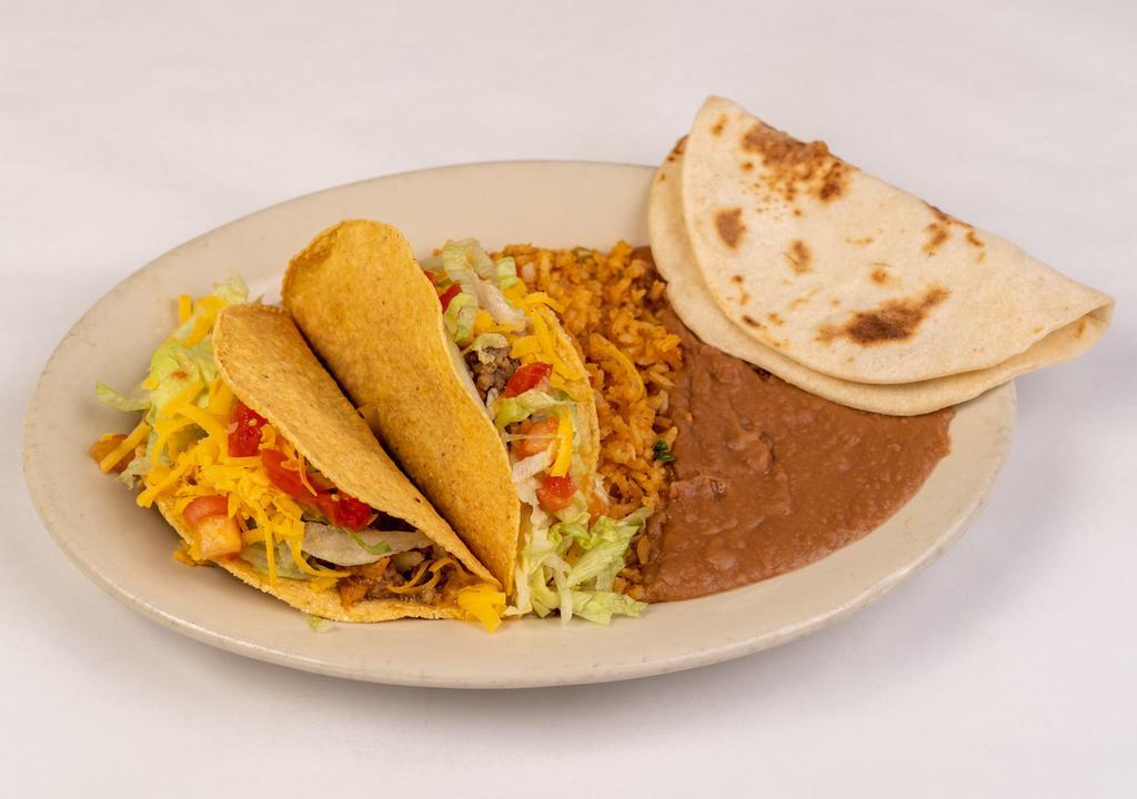 Crispy Taco Plate · Two crispy tacos made with chicken or beef, lettuce, tomato, and cheese.
