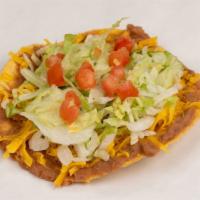 Bean & Cheese Chalupa · Made on a corn tortilla shell with refried beans. Topped with lettuce, tomato, and cheese.