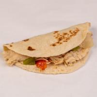 Soft Chicken Taco · With lettuce tomato and cheese.